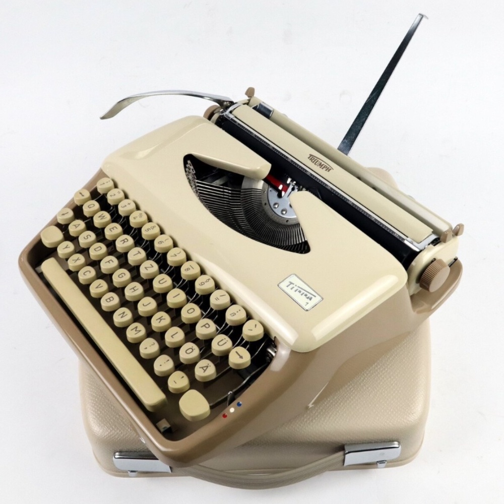 Two-Tone Beige and Tan colored Triumph Tippa Typewriter